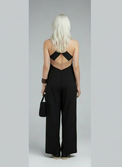 Back pose of the model wearing Delphine | Kreuzkleid