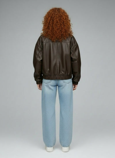 Back pose of the model wearing Amara™ | Kunstlederjacke