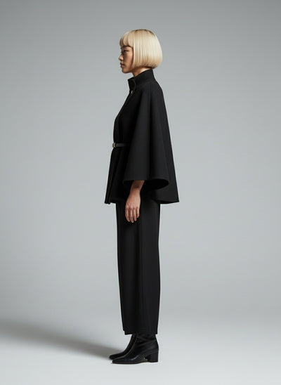Side profile of the model wearing Annalena™ | Mantel mit Gürtel