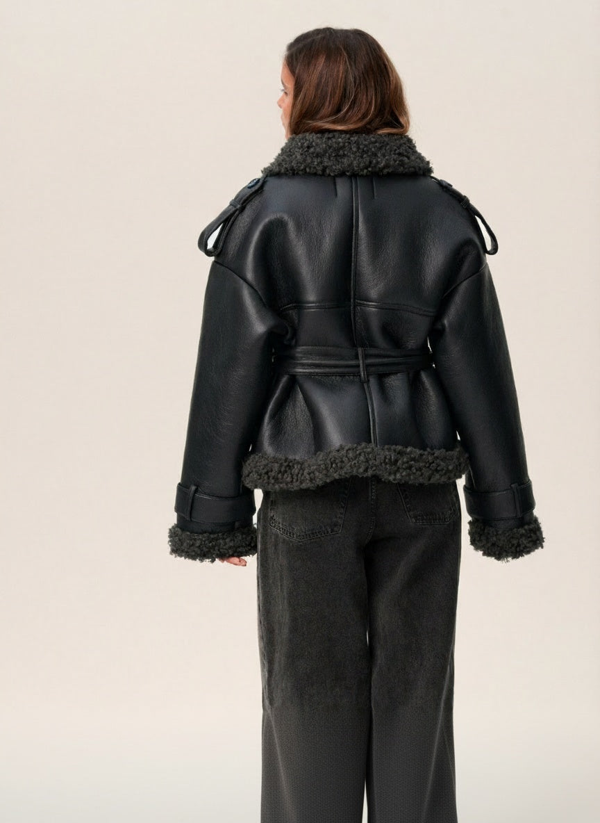 Back pose of the model wearing Elvira | Belted Shearling Coat