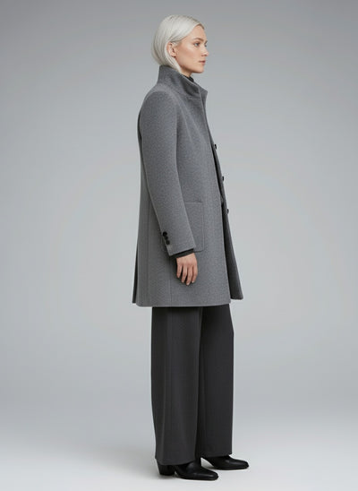 Side profile of the model wearing Stella™ | Damenjacke mit Stehkragen